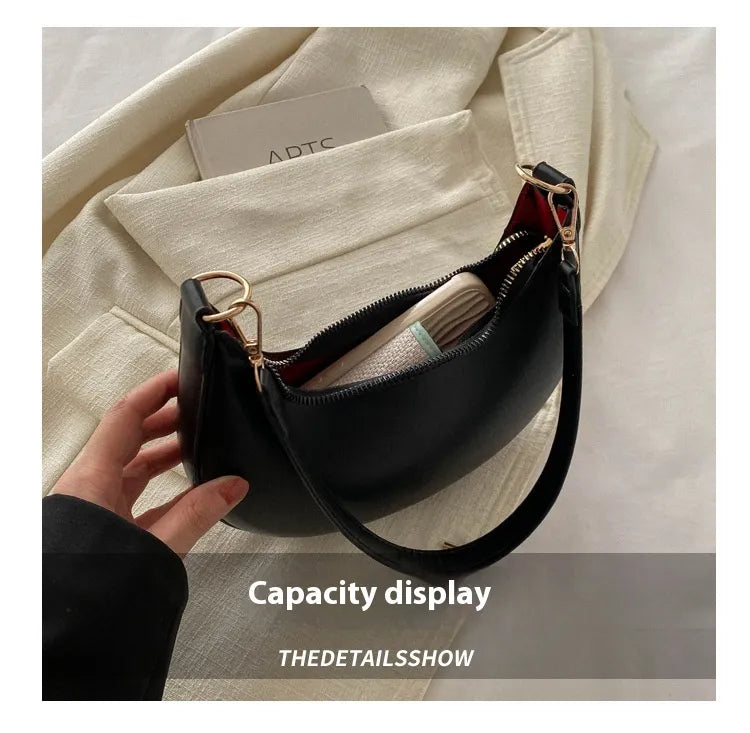 ROMY | Halve Maan Schoudertas in Minimalistische Stijl – Compact, Elegant & Onverwacht Ruim
