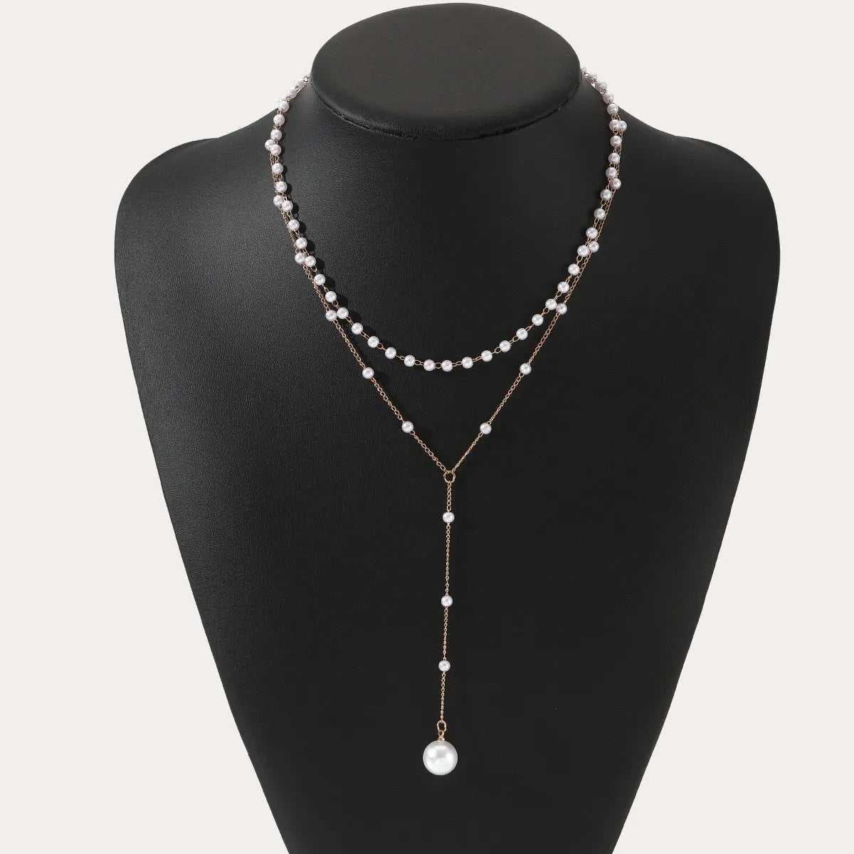 Gouden gelaagde ketting met parels | Luxe statement voor tijdloze elegantie