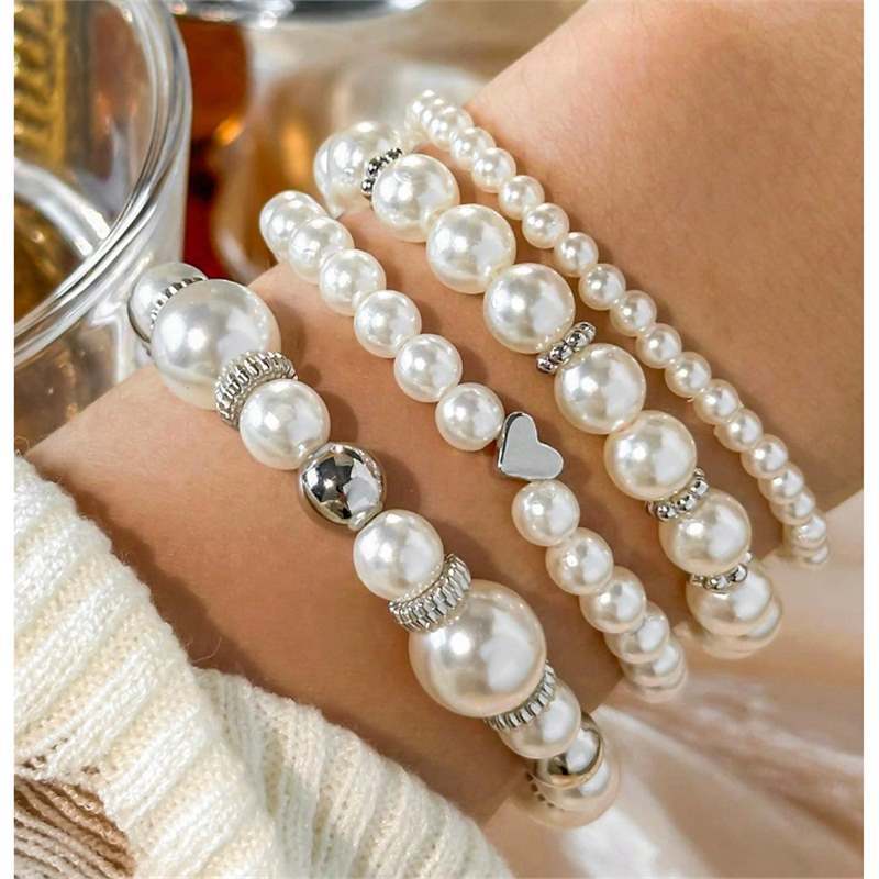RANYA | 4-Delige Dames Armbanden Set met Parels en Glanzende Kralen