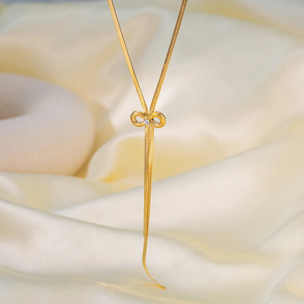 FAYLINN | Goudkleurige Dames Ketting En Oorbellen Set Met Strik Design– Tijdloos, Elegant & Vrouwelijk