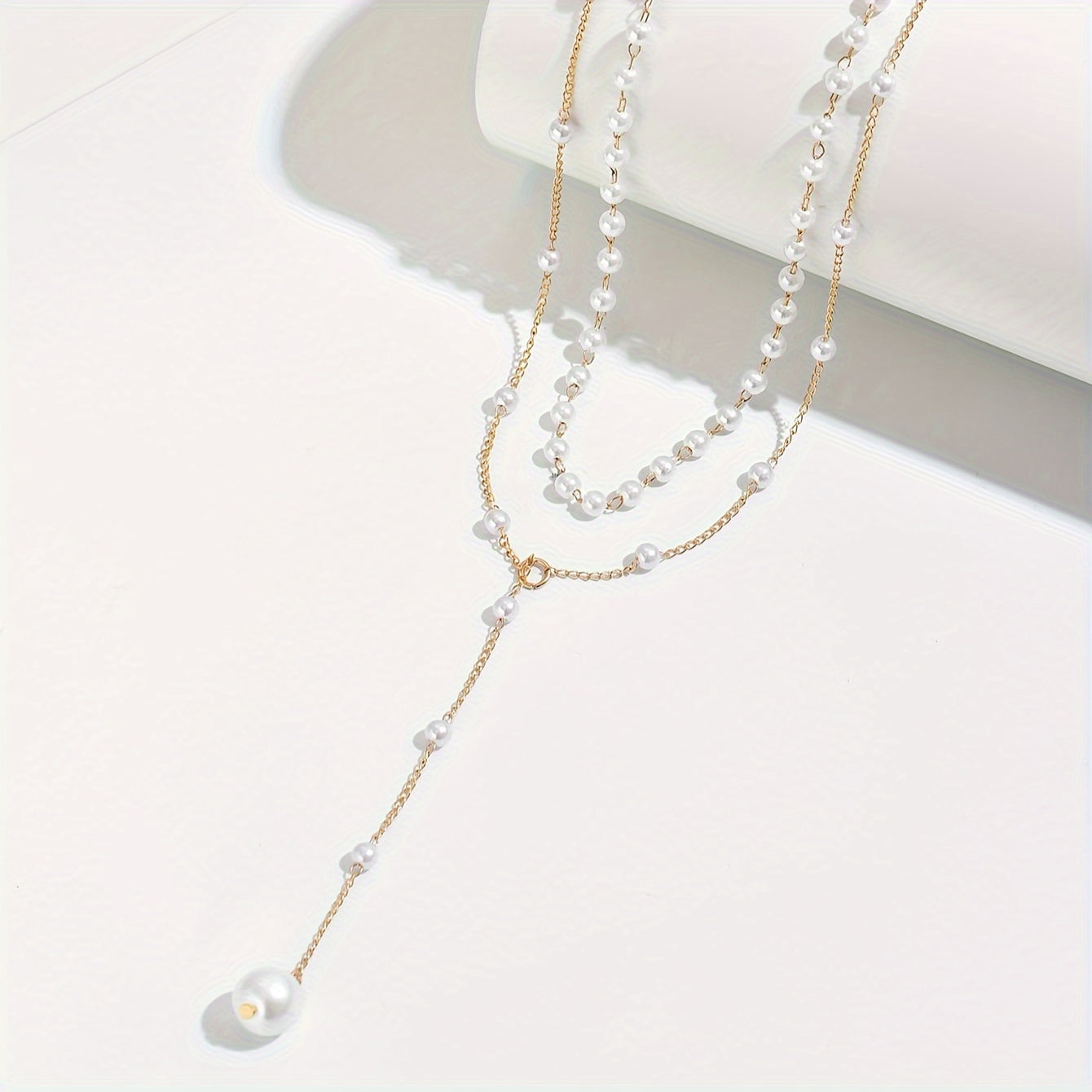 Gouden gelaagde ketting met parels | Luxe statement voor tijdloze elegantie