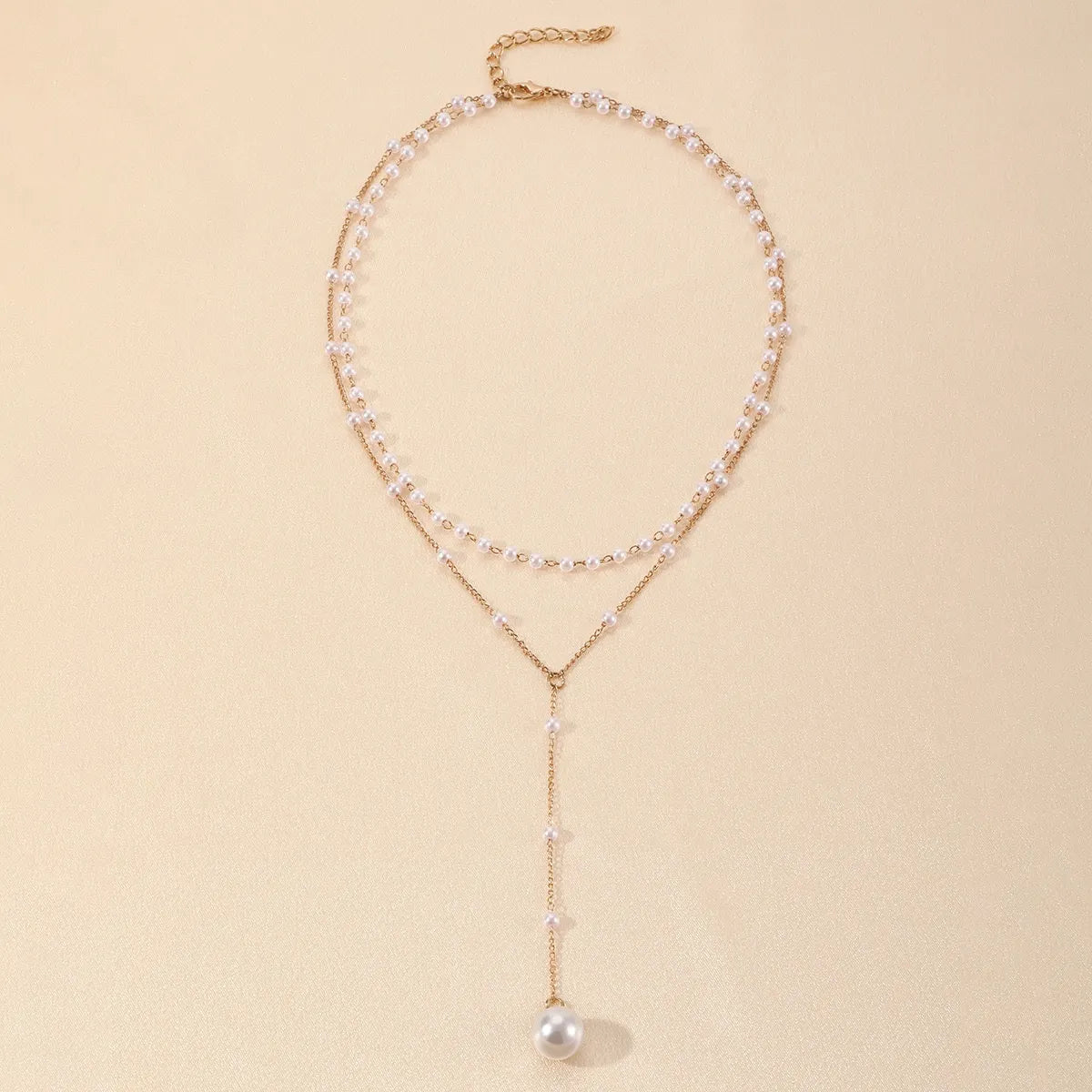 Gouden gelaagde ketting met parels | Luxe statement voor tijdloze elegantie