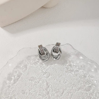 JINTEL | Gedraaide Statement Oorbellen Voor Dames In Zilver – Elegant, Modern, Lichtgewicht