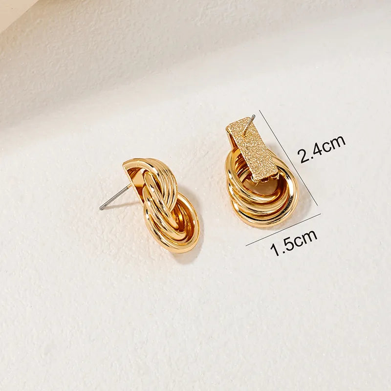 JINTEL | Gedraaide Statement Oorbellen Voor Dames In Goud – Elegant, Modern, Lichtgewicht