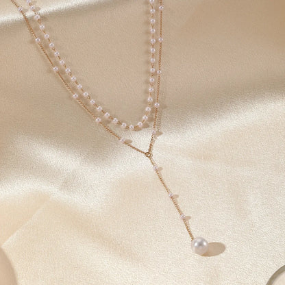 Gouden gelaagde ketting met parels | Luxe statement voor tijdloze elegantie