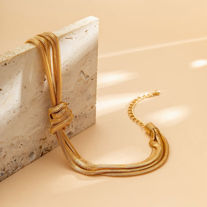 KNOTTA | Knoop Vormige  Dames Ketting - Goud & Zilver Kleurig