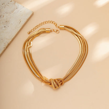 KNOTTA | Knoop Vormige  Dames Ketting - Goud & Zilver Kleurig