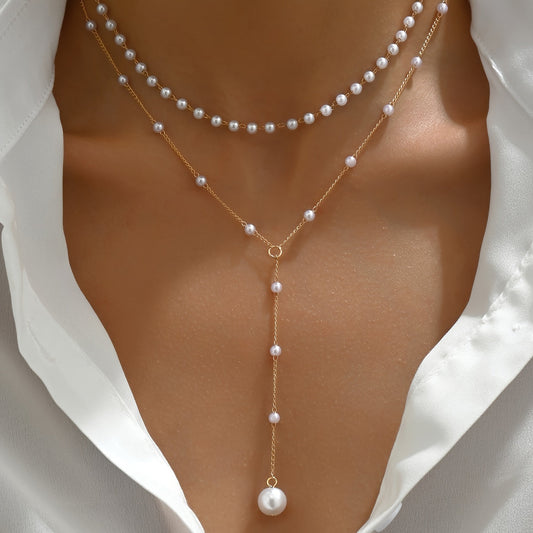 Gouden gelaagde ketting met parels | Luxe statement voor tijdloze elegantie