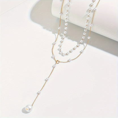 Gouden gelaagde ketting met parels | Luxe statement voor tijdloze elegantie