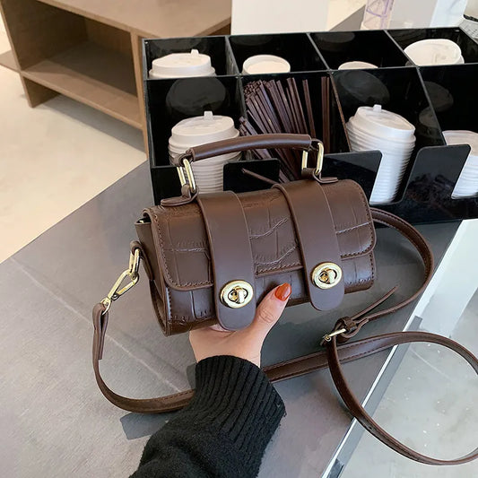 ÉLIANE | Crossbody mini handtas met chique structuur en gouden details